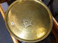 AN EASTERN BRASS TRAY AND A TOBACCO BOX.