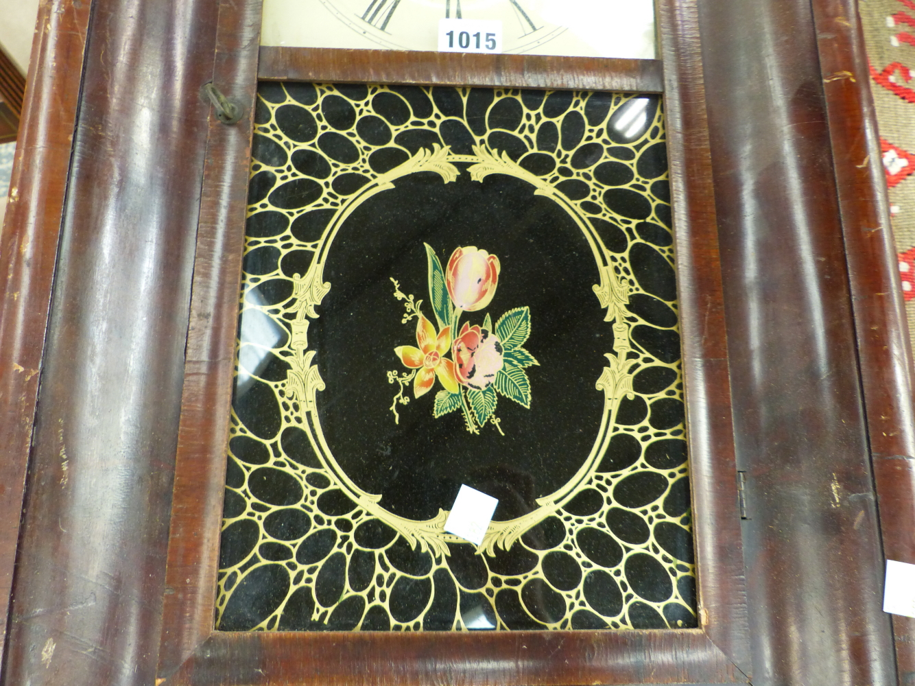 AN AMERICAN GLAZED MAHOGANY CASED WALL CLOCK BY BREWSTER AND INGRAHAMS, THE MOVEMENT STRIKING ON A - Image 3 of 5