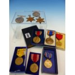 A COLLECTION OF FIVE BOXED AMERICAN WORLD WAR II MEDALS, TWO OTHER MEDALS AND A BRITISH WORLD WAR II