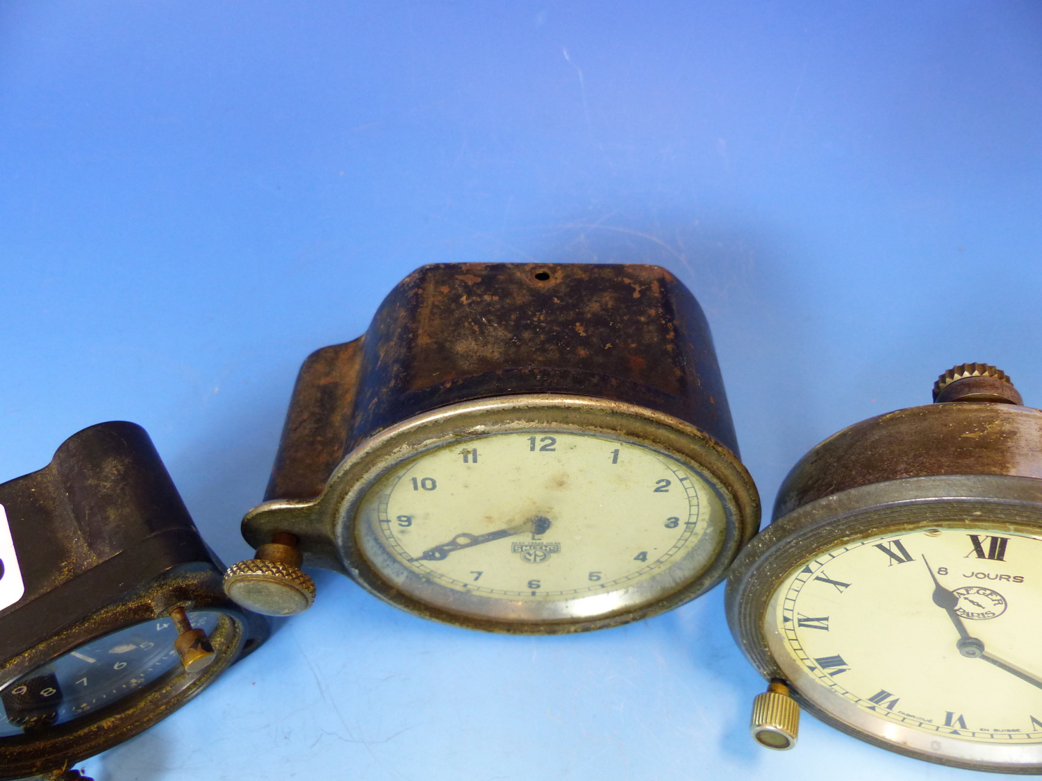 THREE CAR CLOCKS, ONE BY JAEGER. Dia. 9.5cms. ANOTHER BY SMITHS, Dia. 9cms. THE LAST IN BLACKENED - Image 6 of 9