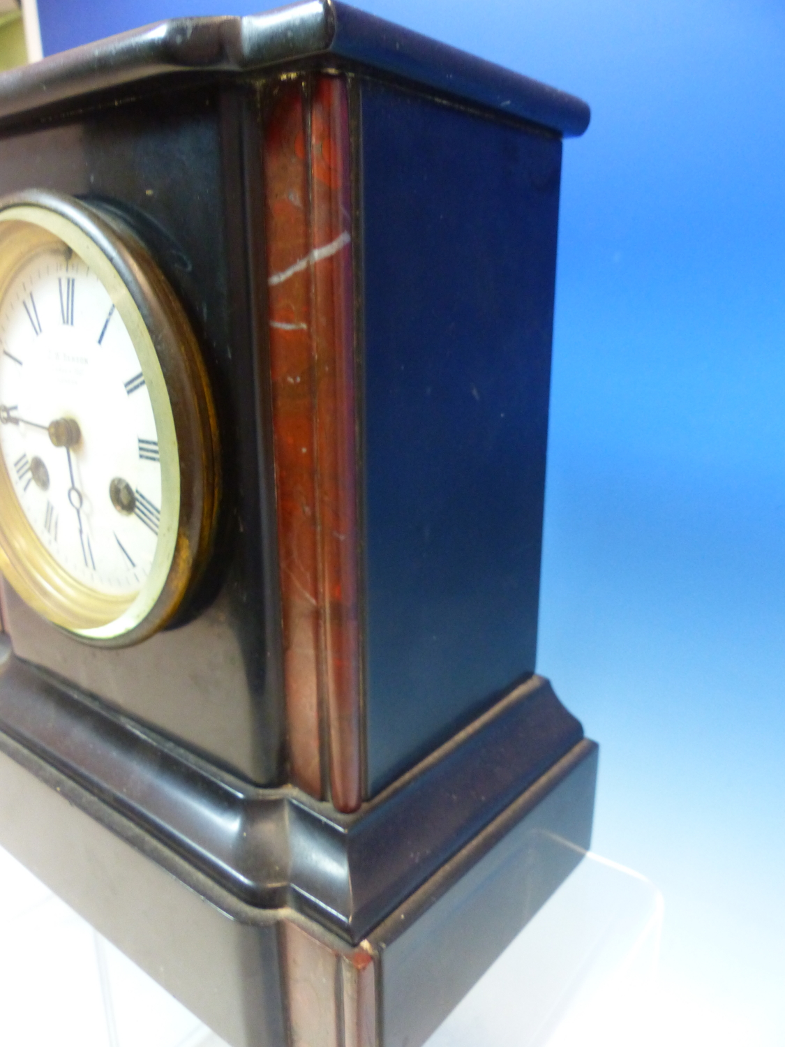 A BLACK SLATE CLOCK RETAILED BY J W BENSON NAMED ON THE DIAL BETWEEN TWO RED STONE COLUMNS AND ON - Image 5 of 7