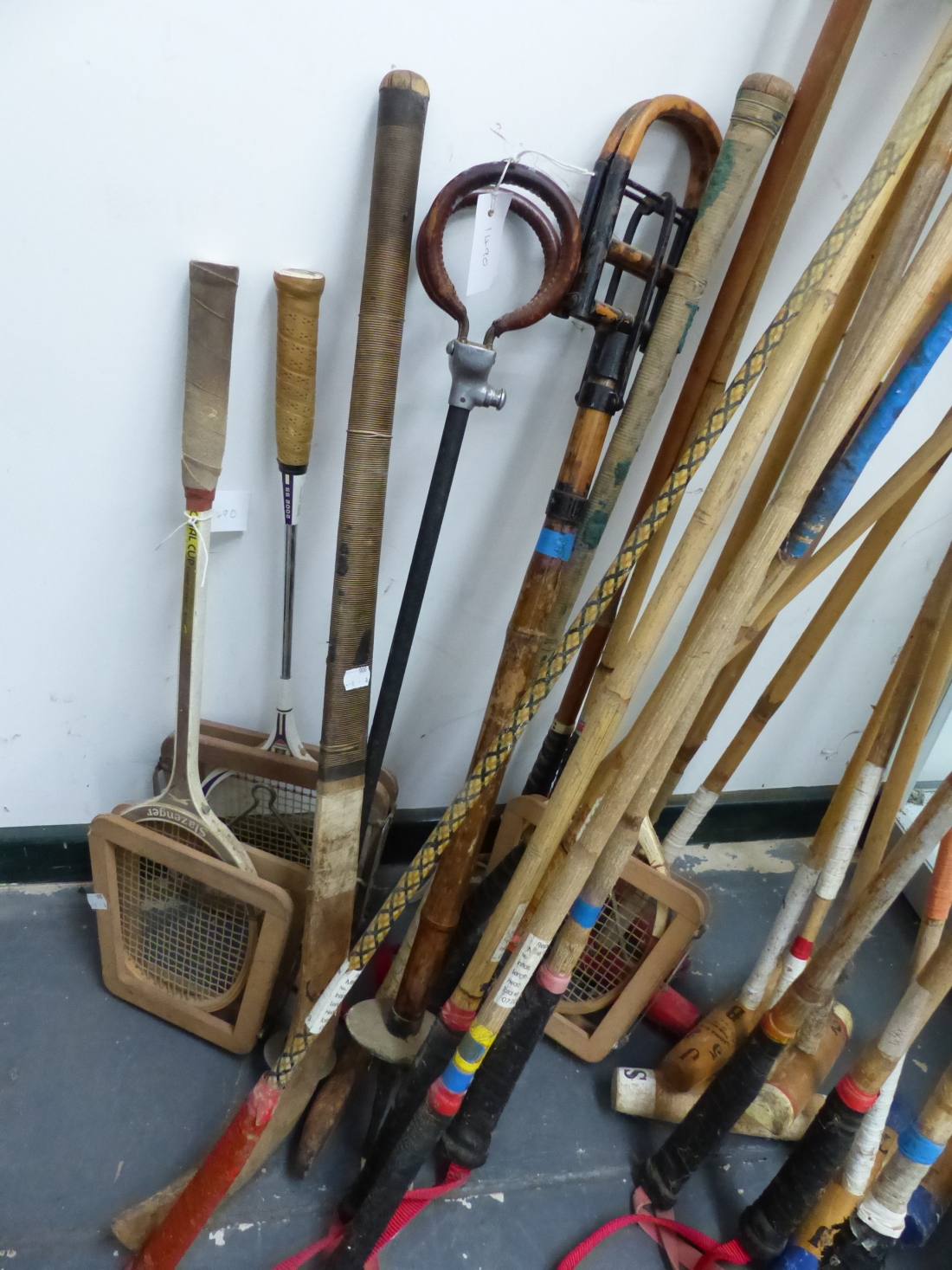 A LARGE COLLECTION OF POLO MALLETS AND HELMETS, TOGETHER WITH TWO SHOOTING STICKS, ETC (QTY). - Image 2 of 3