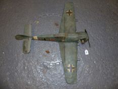 A GERMAN WORLD WAR II MODEL WAR PLANE POWERED BY A LIVE FUEL ENGINE, THE WINGSPAN. W 85cms.