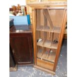 AN EARLY 20th.C. "DISQUE" RECORD CABINET AND AN OAK TAMBOUR FRONT CABINET.