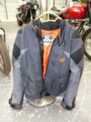 AN AKITO MOTORCYCLE JACKET.