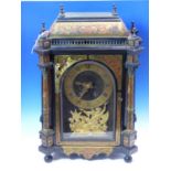 AN 18th C. AND LATER BOULLE CASED MANTEL CLOCK SIGNED J ARTUS PARIS BELOW A FIGURE OF ATLAS