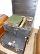 A MAHOGANY TABLE CASE FOR A GRAMOPHONE STILL WITH THE PLAYING ARM FITTING INTO THE SOUND BOX