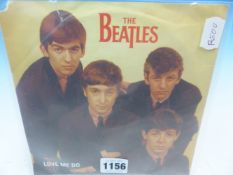 A BEATLES PARLOPHONE 45 RPM SINGLE LOVE ME DO AND P.S. I LOVE YOU, IN ORIGINAL PAPER SLEEVE.