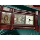 A GLAZED MAHOGANY WALL CLOCK BY BIRGE, BECK & Co. BRISTOL, CONN. THE PENDULUM MOVEMENT STRIKING ON A