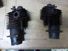 A PAIR OF VINTAGE/ VETERAN V-TWIN CYLINDERS WITH PISTONS