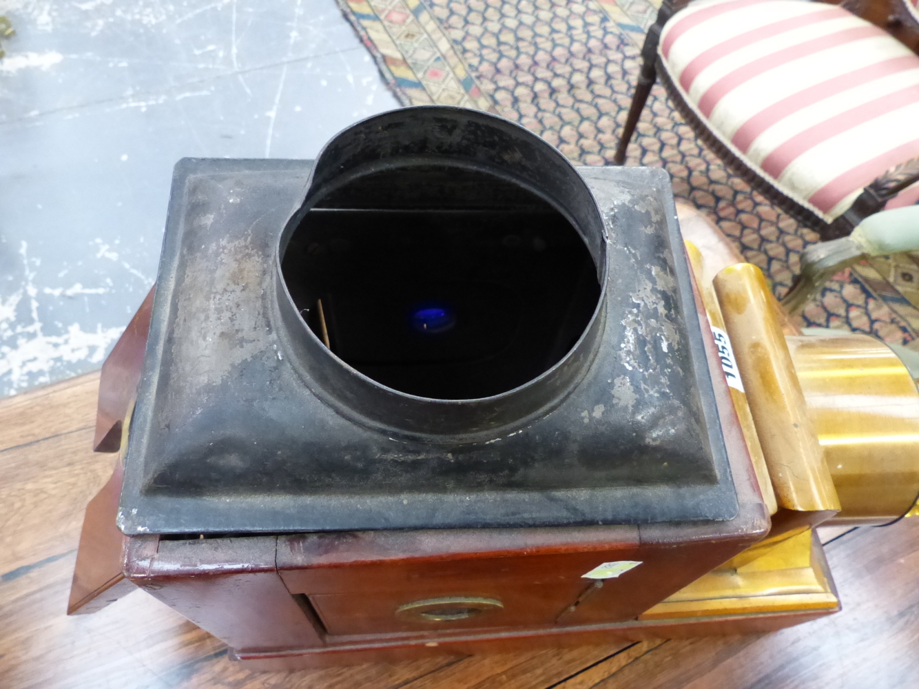 A MAHOGANY MAGIC LANTERN WITH LACQUERED BRASS LENS MOUNTS. W 41cms. - Image 5 of 6