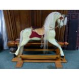 A GOOD QUALITY HAND MADE ROCKING HORSE RESTORED BY ROBERT MULLIS. H.HOOF TO EAR 90cms, OVERALL FLOOR