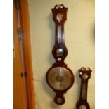 A HARRIS OF WITNEY WALNUT WHEEL BAROMETER, THE BROKEN ARCH PEDIMENT ABOVE DRY/DAMP DIAL, ALCOHOL