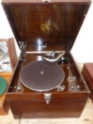 AN HMV MODEL 113A WOOD CASED WIND UP TABLE TOP GRAMOPHONE WITH SIDE CARRYING HANDLE AND CHROME CORNE