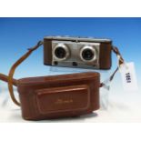 A LEATHER CASED ILOCA STEREO RAPID CAMERA WITH STEINHEIT LENSES.