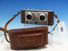 A LEATHER CASED ILOCA STEREO RAPID CAMERA WITH STEINHEIT LENSES.