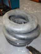 A PAIR OF VINTAGE MICHELIN 5.25/5.50 x 19 TYRES, TOGETHER WITH VARIOUS INNER TUBES.