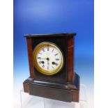 A BLACK SLATE CLOCK RETAILED BY J W BENSON NAMED ON THE DIAL BETWEEN TWO RED STONE COLUMNS AND ON
