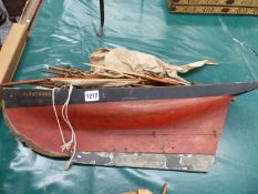 A SMALL ANTIQUE SCRATCH BUILT POND YACHT, MODEL OF THE SAIL BOAT "ALBATROSS", WITH BLACK AND RED