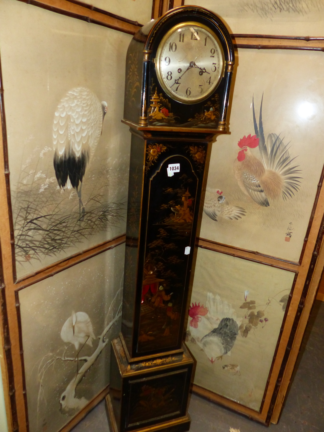 A CHINOISERIE PAINTED BLACK LACQUER GRANDMOTHER CLOCK WITH THE EMBEE MOVEMENT STRIKING ON A COILED