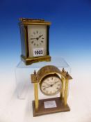 A GLAZED BRASS CASED CARRIAGE TIME PIECE, THE BACK PLATE STAMPED A C G IN AN OVAL. H 12.5cms.