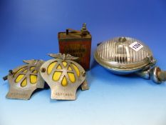 A LUCAS FOG LAMP. Dia. 15cms. TWO WING TOPPED AA BADGES, TOGETHER WITH A JUNIOR SHELL CAN FOR