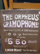 THE ORPHEUS GRAMOPHONE, A PAINTED CARD ADVERTISEMENT FOR 250 INSTRUMENTS AT A DISCOUNTED PRICE OF £