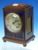 A MAHOGANY CASED JAPY FRERES CLOCK STRIKING ON A COILED ROD, THE CIRCULAR SILVERED DIAL WITHIN