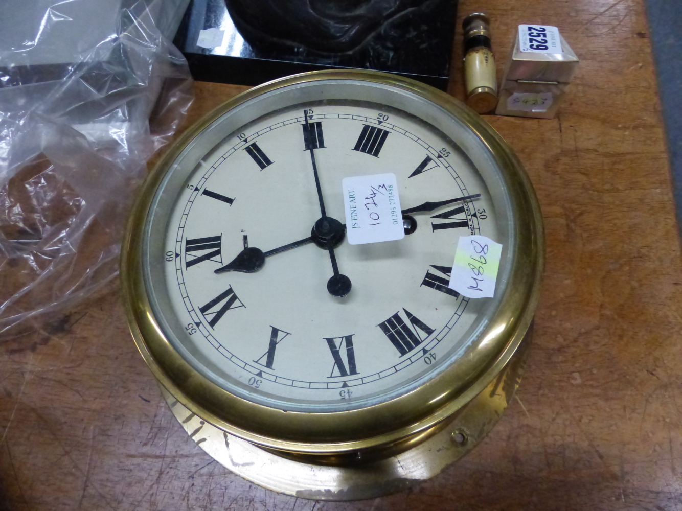 AN ELLIOTT BRASS CASED SHIPS TIMEPIECE ANOTHER BY GENERAL ELECTRIC TOGETHER WITH A SEWILL BRASS - Image 4 of 4