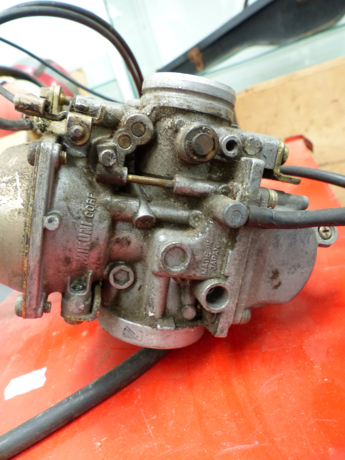 A BANK OF FOUR MIKUNI CARBURETORS AND A BOX OF TOOL AND BIKE SPARES. - Image 2 of 7