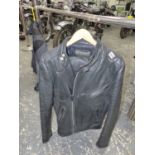 A BELSTAFF LEATHER MOTORCYCLE JACKET AND TROUSERS.