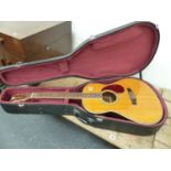 A COPY OF A GIBSON ACCOUSTIC GUITAR, No 38090 WITH A CARRYING CASE. NOTE THIS GUITAR IS A RE-BADGED