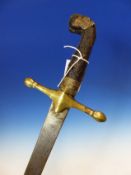 A SHAMSHIR WITH CORK HANDLE AND BRASS QUILLONS, THE CURVED BLADE WITH SINGLE EDGE. H 93cms