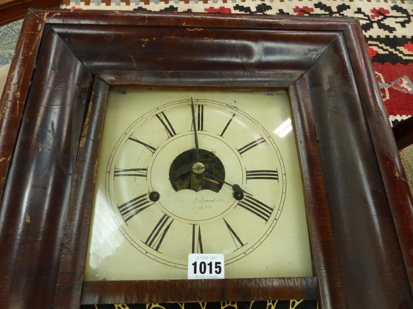 AN AMERICAN GLAZED MAHOGANY CASED WALL CLOCK BY BREWSTER AND INGRAHAMS, THE MOVEMENT STRIKING ON A - Image 4 of 5