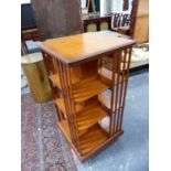 A GOOD LATE VICTORIAN OAK FOUR TIER REVOLVING BOOKCASE. 60 x 60 x H.120cms.