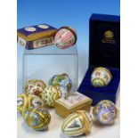 A COLLECTION OF SEVENTEEN HALCYON DAYS AND OTHER ENAMEL EASTER EGGS TOGETHER WITH SEVEN VARIOUS