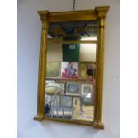 A REGENCY STYLE GILT FRAMED RECTANGULAR MIRROR, THE UPPER PANEL PRINTED WITH MUSICAL TROPHIES AND