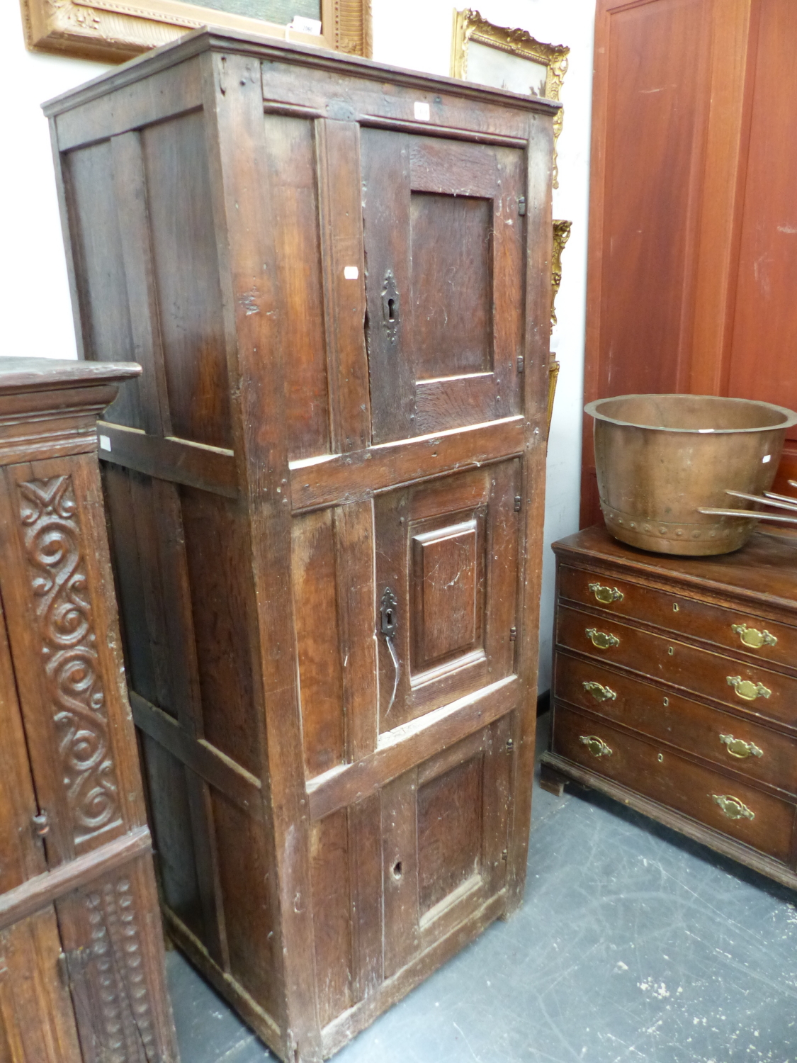 AN 18th.C.AND LATER DUTCH OAK HALL CABINET WITH THREE PANEL DOORS. W.75 x D.55 x H.186cms.