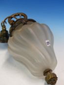 A BRONZE MOUNTED FROSTED GLASS LANTERN, THE SINUOUSLY RIBBED PEAR SHAPE WITH ORMOLU FRUITING BODY