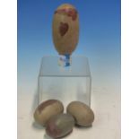 A COLLECTION OF FOUR INDIAN RIVER POLISHED LINGAM STONES, THE LARGEST. W 10cms.