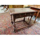 AN 18th.C.OAK SIDE TABLE WITH FRIEZE DRAWER OVER BOBBIN TURNED LEGS AND STRETCHER. W.77 x D.45. x