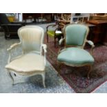 TWO SIMILAR ANTIQUE LOUIS XV STYLE, PAINTED SHOW FRAME SALON ARMCHAIRS ON CABRIOLE LEGS (2).