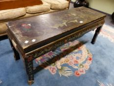 A CHINESE BROWN LACQUER COFFEE TABLE, THE RECTANGULAR TOP PAINTED WITH AN ISLAND SCENE CENTRAL TO