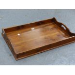 A YEW WOOD RECTANGULAR TRAY WITH HANDLED PIERCED TO EACH NARROW END OF THE GALLERY. 66 x 44cms.