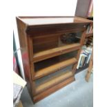 A GLOBE WERNICKE TYPE THREE TIER BOOKCASE. 87 x 36 x H. 102cms.