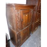 AN 18th.C. AND LATER FRENCH PROVINCIAL OAK TWO DOOR LARDER CABINET WITH CARVED DECORATION. 91 x 53 x