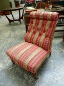 A VICTORIAN BUTTON BACK DEEP SEAT SALON CHAIR.