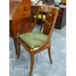 A PAIR OF FRENCH EMPIRE STYLE CHAIRS WITH EGYPTIAN STYLE ORMOLU MOUNTS.