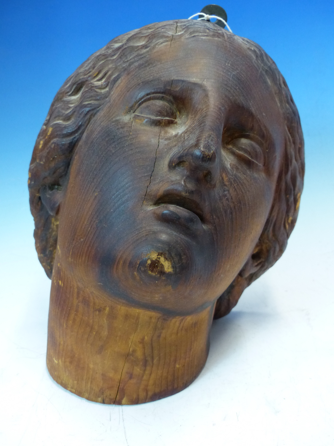 A CARVED PINE HEAD OF A FEMALE SAINT LOOKING HEAVENWARDS. H 26cms. - Image 5 of 6