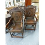 A PAIR OF LATE 17th.C.STYLE OAK WAINSCOT CHAIRS WITH CARVED BORDERS AND SCROLLWORK PEDIMENT.